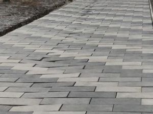 Подрядчик устранит дефекты тротуаров улиц Пояркова и Курашова до конца мая