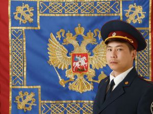 В УФСИН наградили сотрудников личной фотографией, снятой у развернутого Знамени уголовно-исполнительной системы