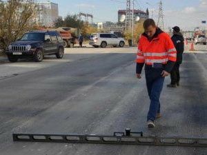 Работы по укладке асфальтобетонного покрытия на дорогах в Якутске завершены на 100%